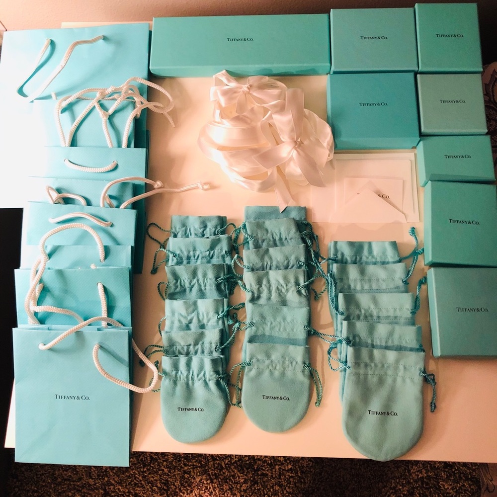 Lot of authentic bags, boxes, pouches, ribbons